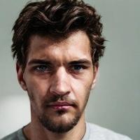 Максим Комраков